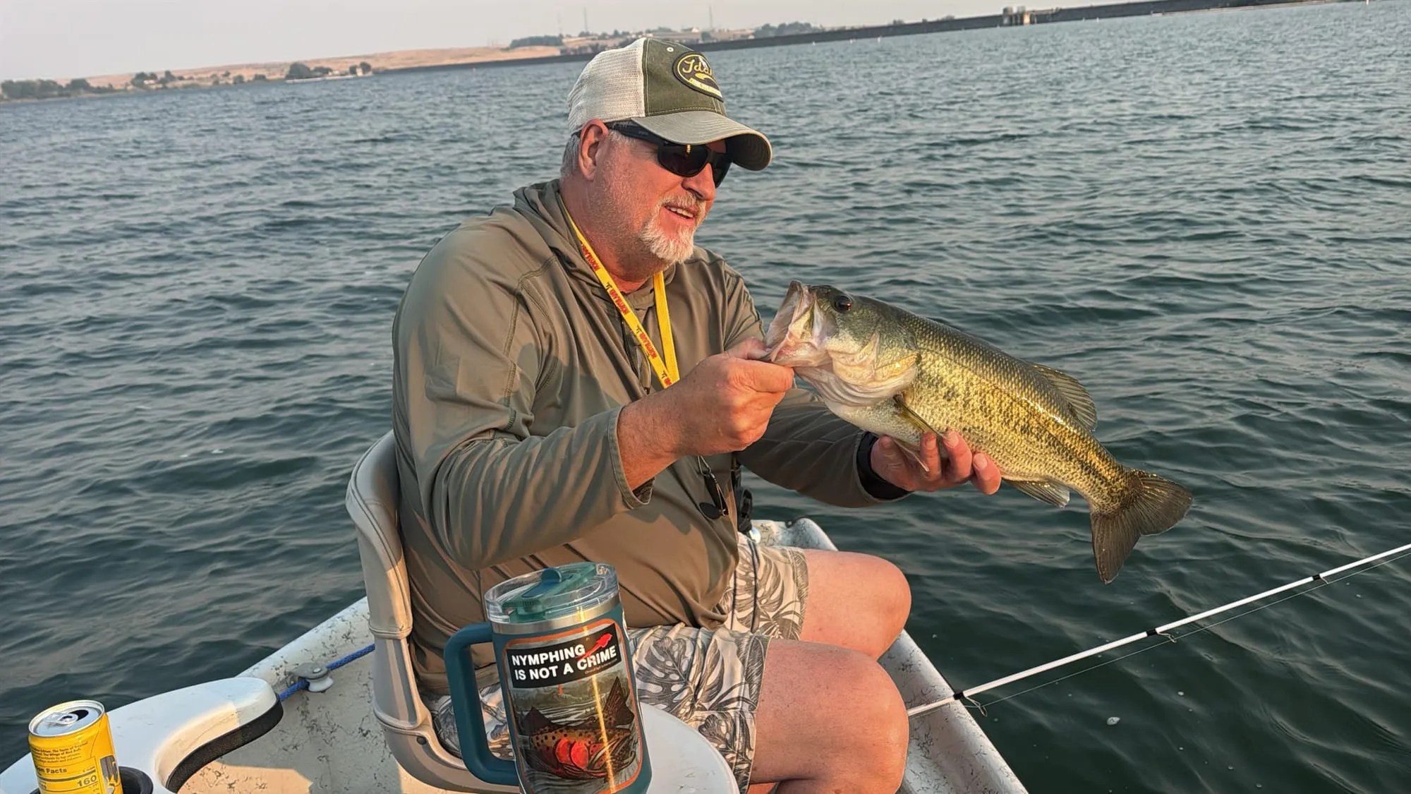 A largemouth bass on an early morning lake