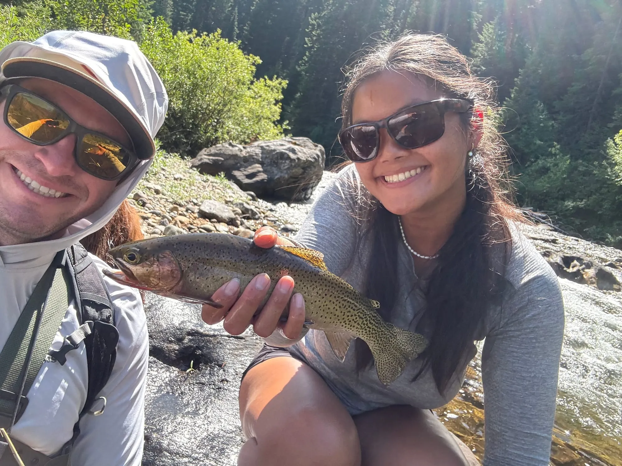 Selfie with a cutthroat on the riverbank