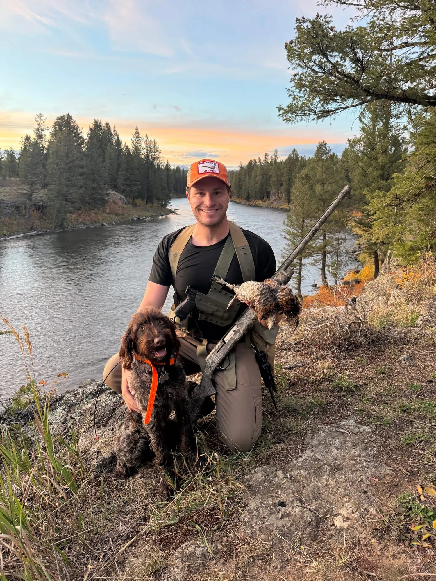 With Odie and a grouse above the river at sunset