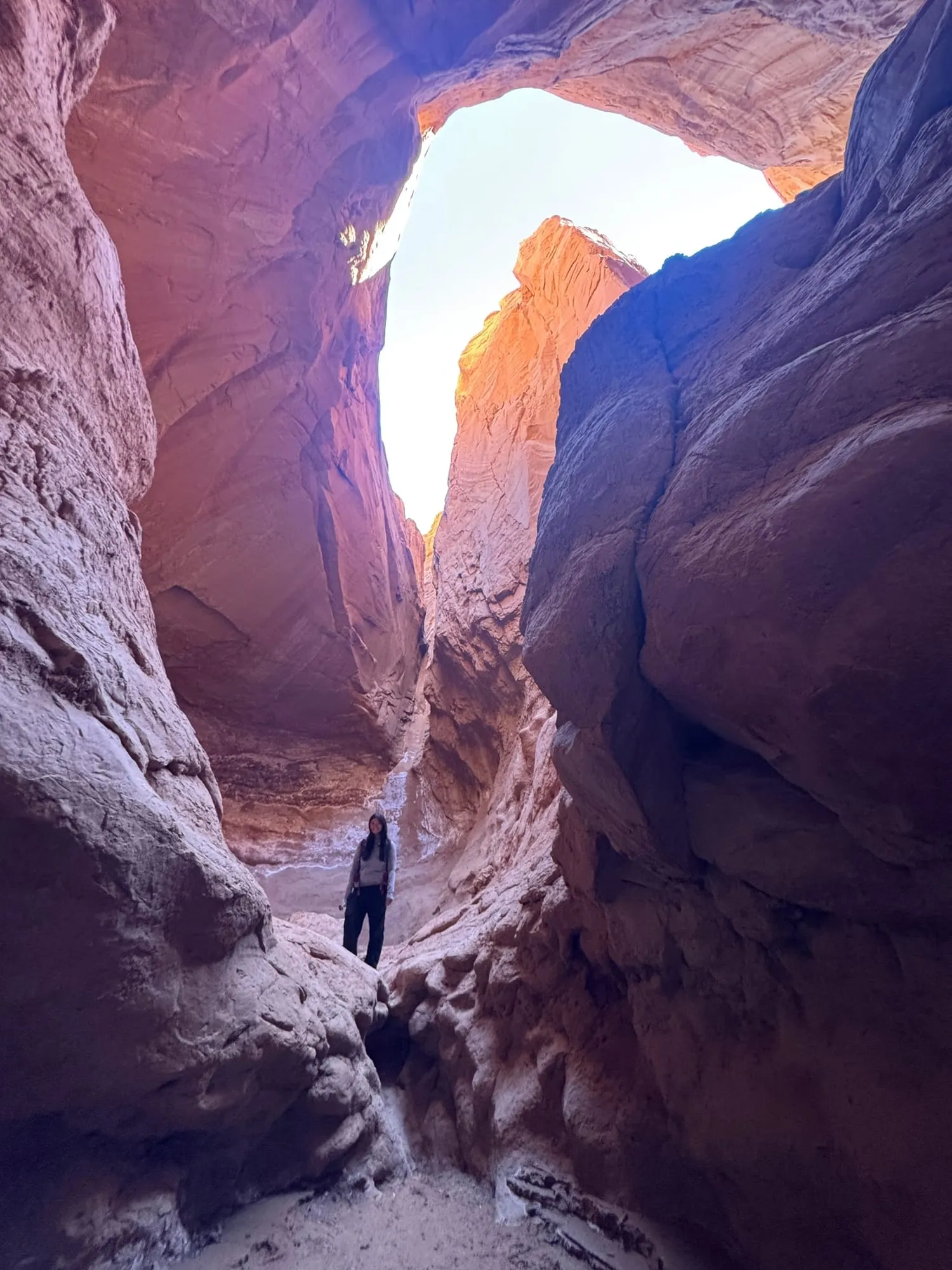 Light pouring into a deep slot canyon