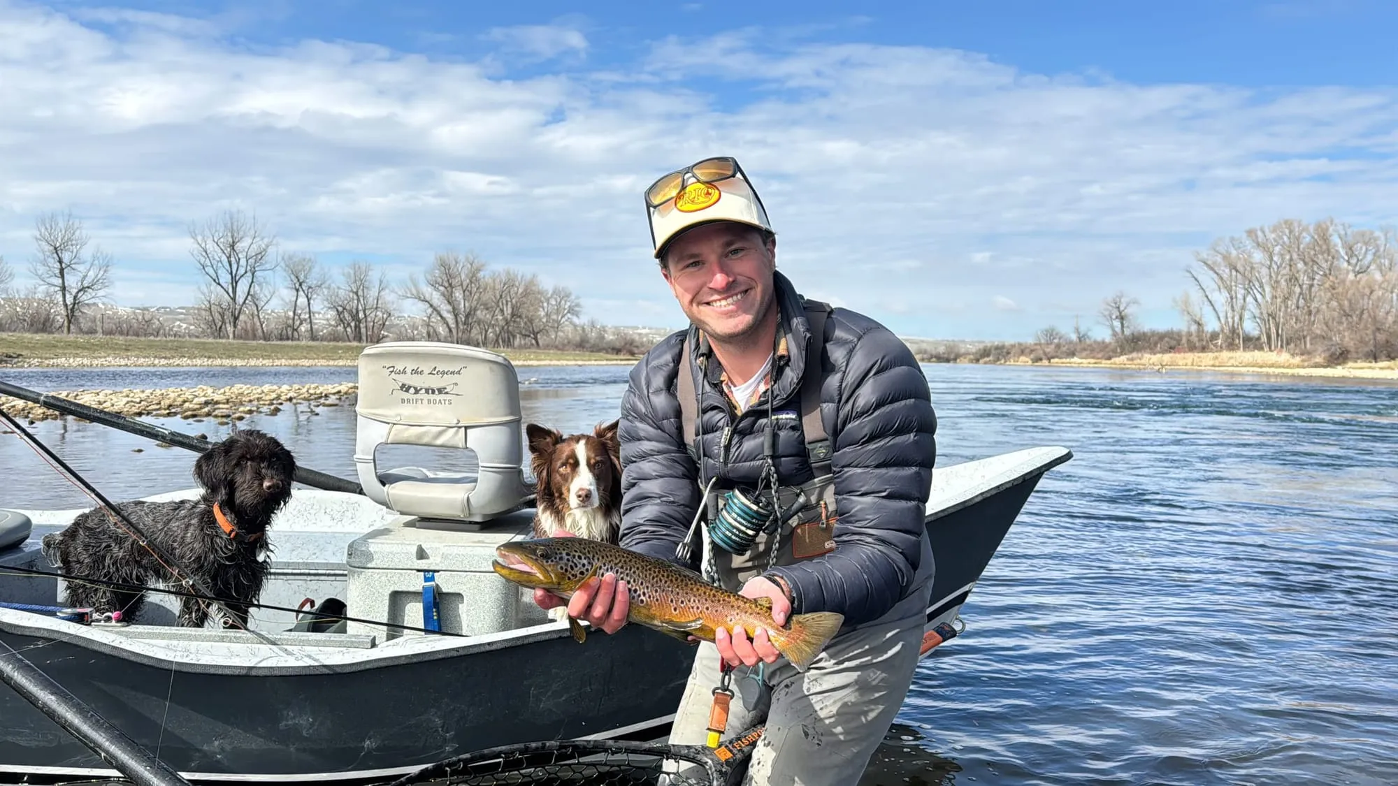 A brown trout beside the drift boat