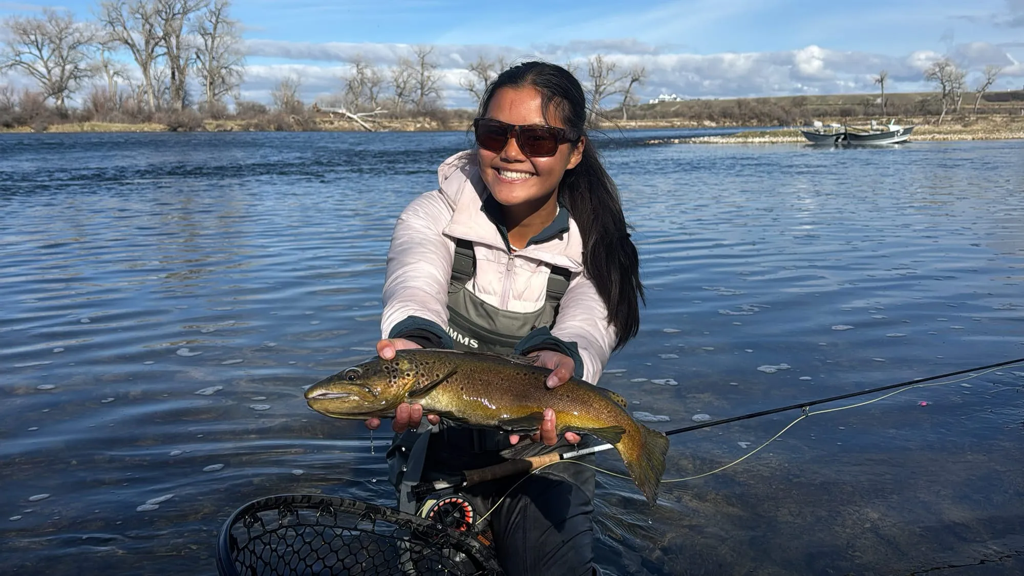 A brown trout over the net